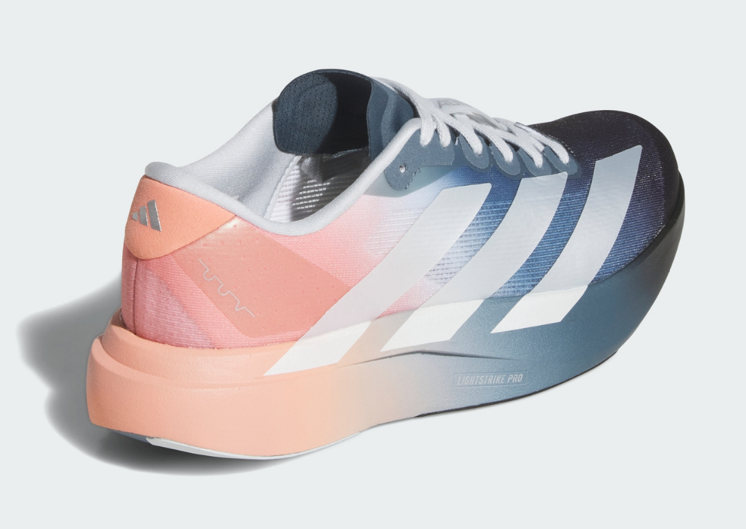 The Whitaker Group x adidas Adizero Evo SL Do Not Duplicate Dayglow Black Clay - Heel Angle