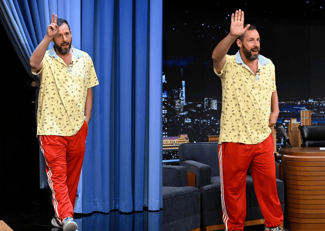 Adam Sandler wearing red adidas track pants on The Tonight Show