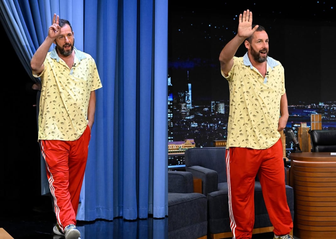 Adam Sandler wearing red adidas track pants on The Tonight Show