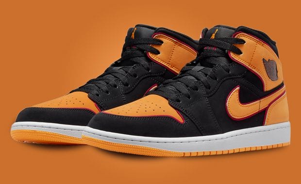 The Air Jordan 1 Mid SE Black Vivid Orange Cardinal Red Features A Padded Tongue