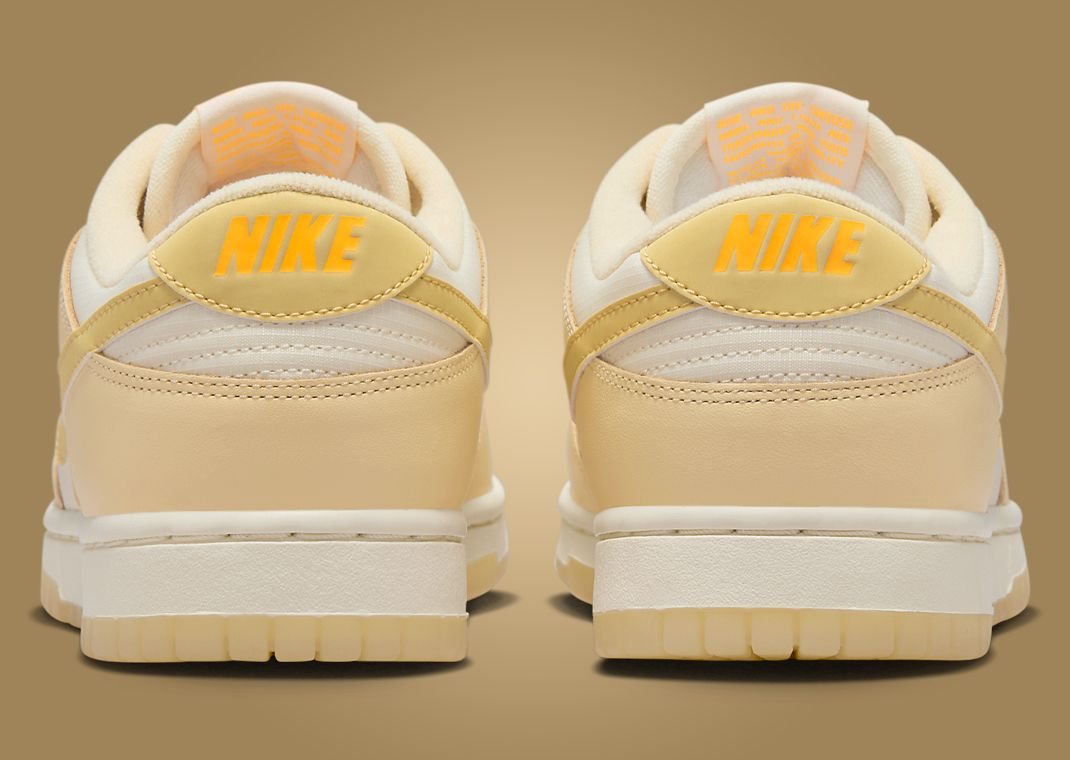Nike Dunk Low Muslin Team Gold (W) Heel