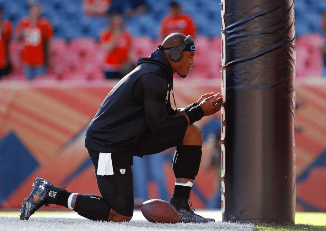 Cam Newton wearing custom Under Armour Cleats (2016)