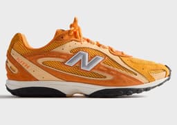 Kith x New Balance 204L Orange Lateral