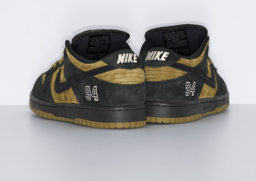 Supreme x Nike SB Dunk Low Camper Green Heel Angle