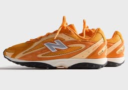 Kith x New Balance 204L Orange Lateral