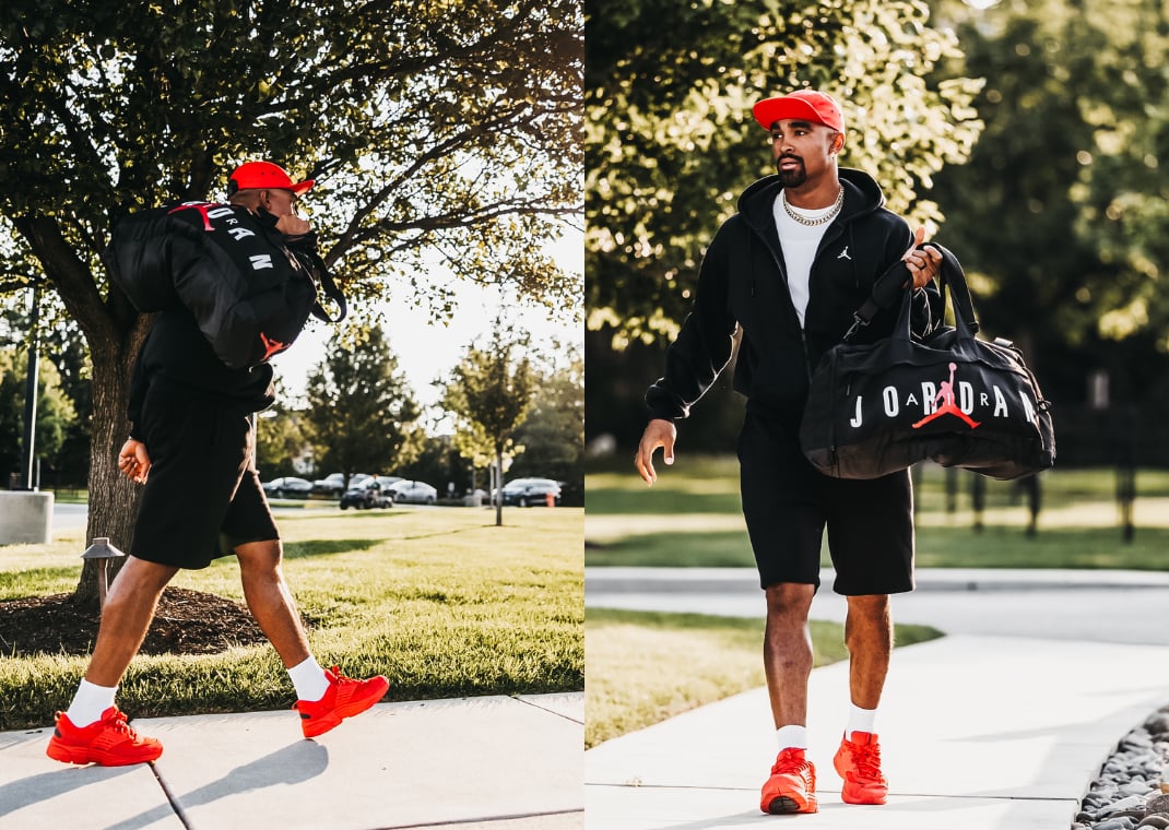 Jalen Hurts wearing an all-red Jordan Trunner O/S