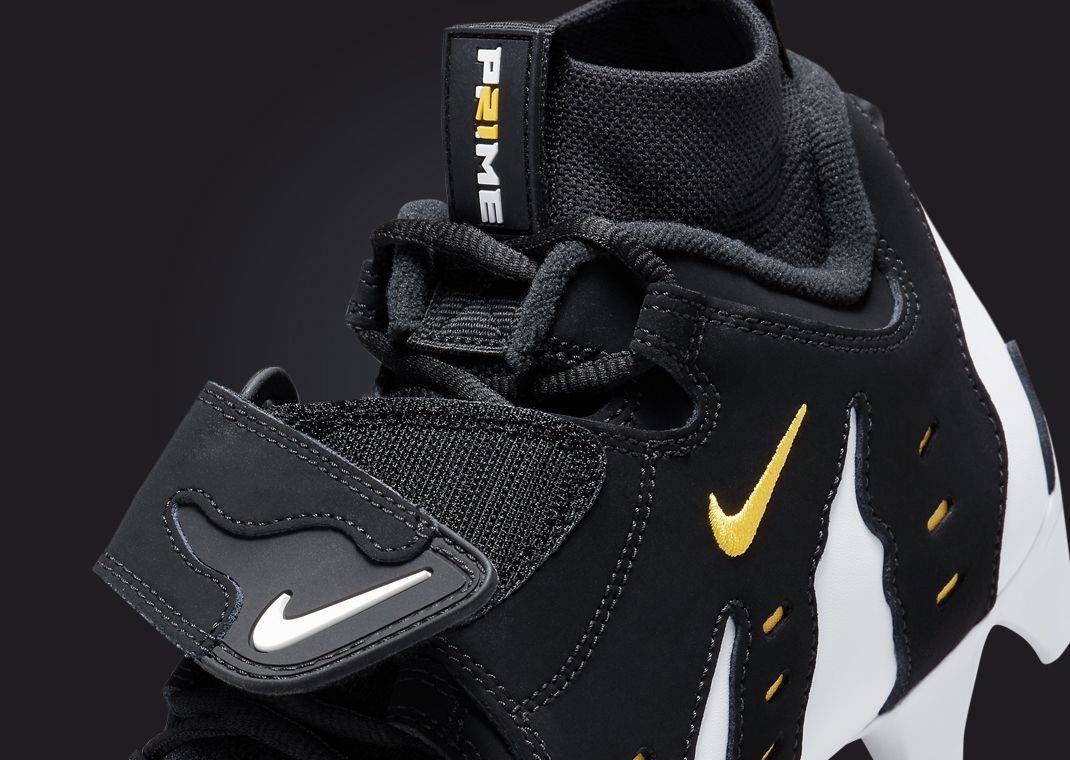 The Nike Air DT Max 96 TD Cleat Black Varsity Maize Releases June 2024