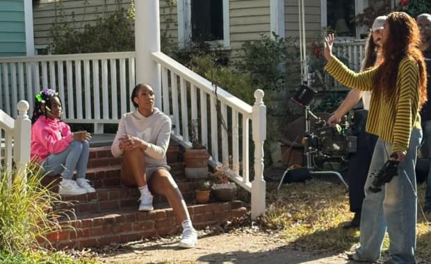 Malia Obama on set with A'ja Wilson