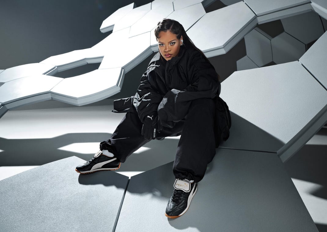 Rihanna posing for her Fenty x Puma partnership