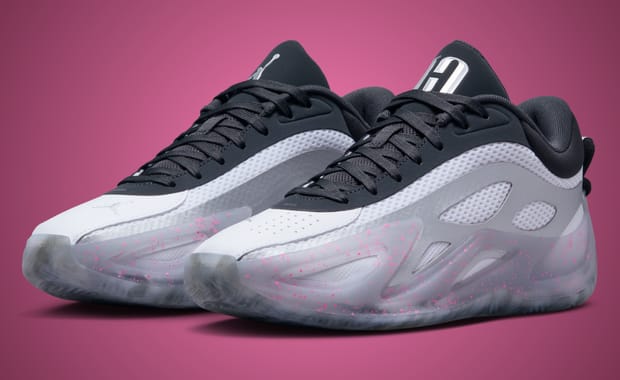 This White Metallic Jordan Heir Series 2 adds Pink Paint Speckles for a Splash of Color