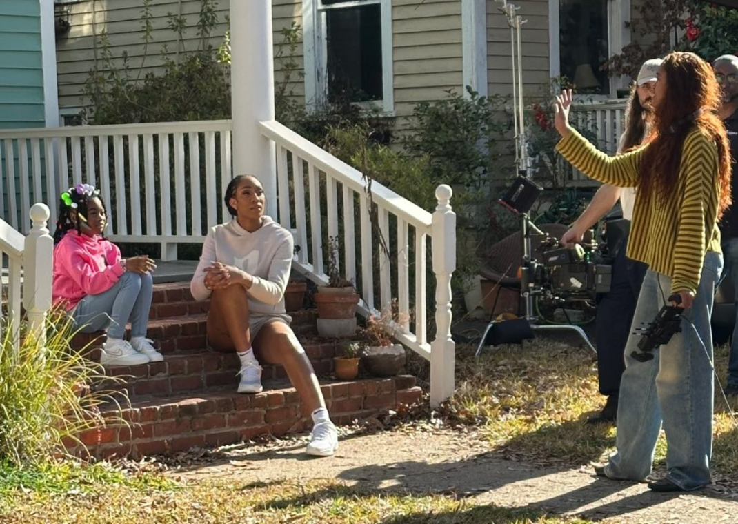 Malia Obama on set with A'ja Wilson