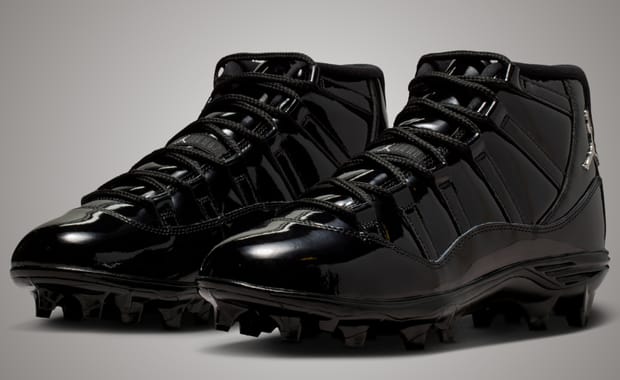 Jordan adds Triple Black Patent Leather to Jordan 11 Football Cleats