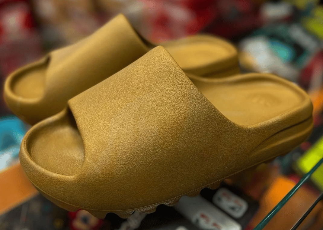 The adidas Yeezy Slide Arrives In Ochre