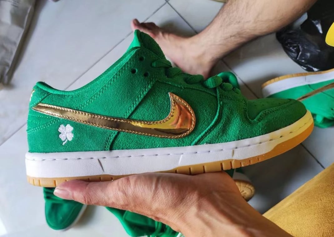 In hand image of the Nike SB Dunk Low St. Patrick's Day