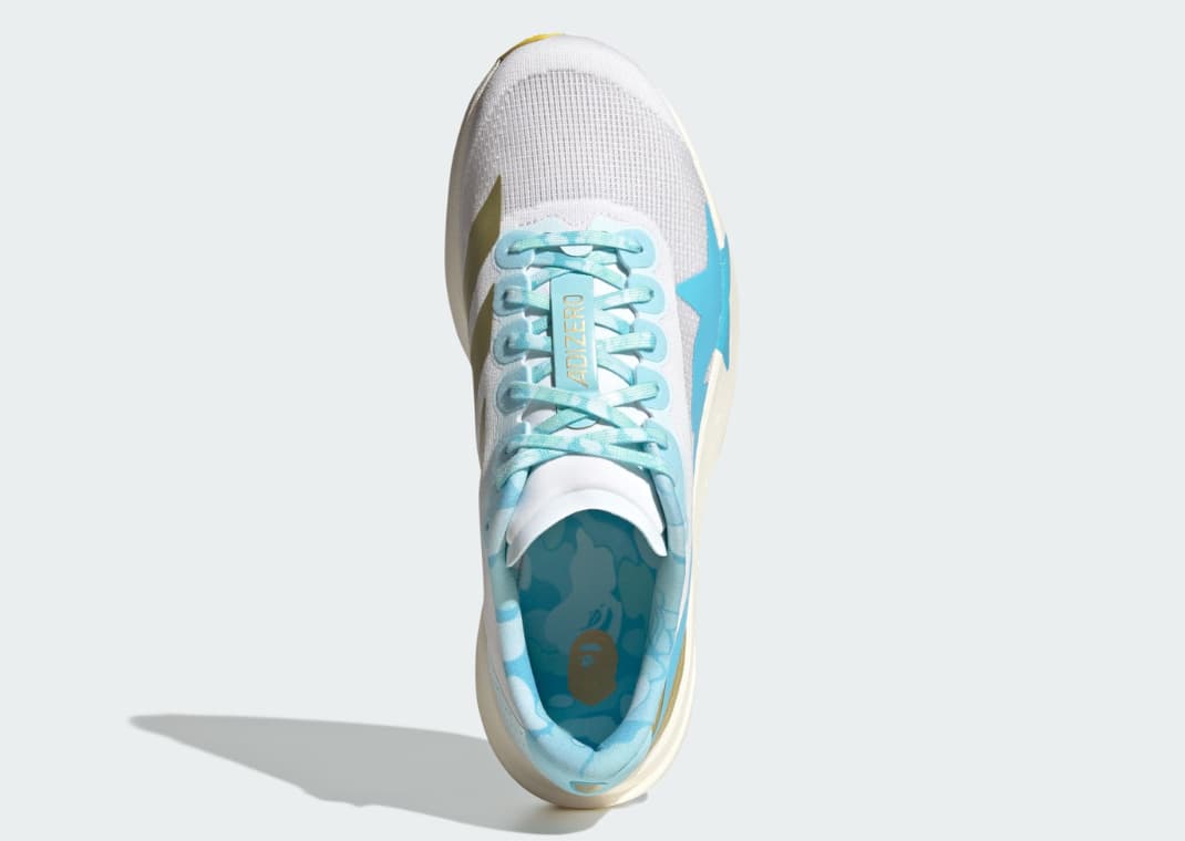 BAPE x adidas Adizero EVO SL pink left shoe lateral view showing Three-Stripes in pink and gold Shooting Star on medial