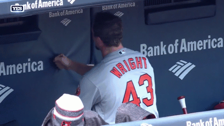 Oriole player punching dugout