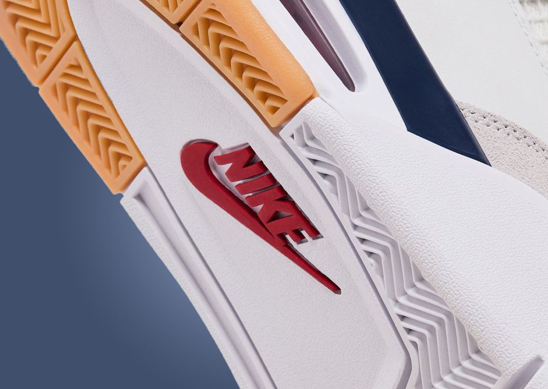 The Nike SB x Air Jordan 4 Summit White Navy Releases March 2025