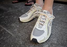AURALEE x New Balance 204L Grey Angle