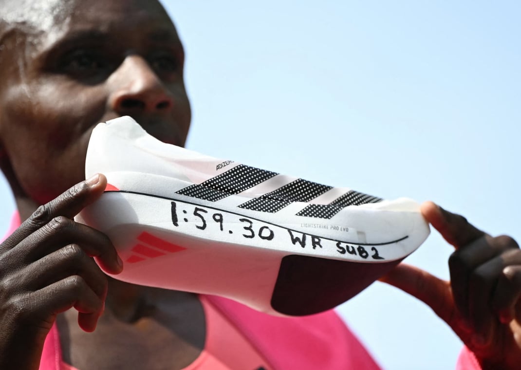Sebastian Sawe holding the adidas Adizero Adios Pro Evo 3 after breaking the marathon world record