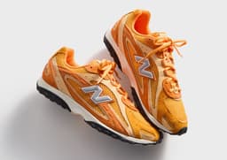 Kith x New Balance 204L Orange Angle