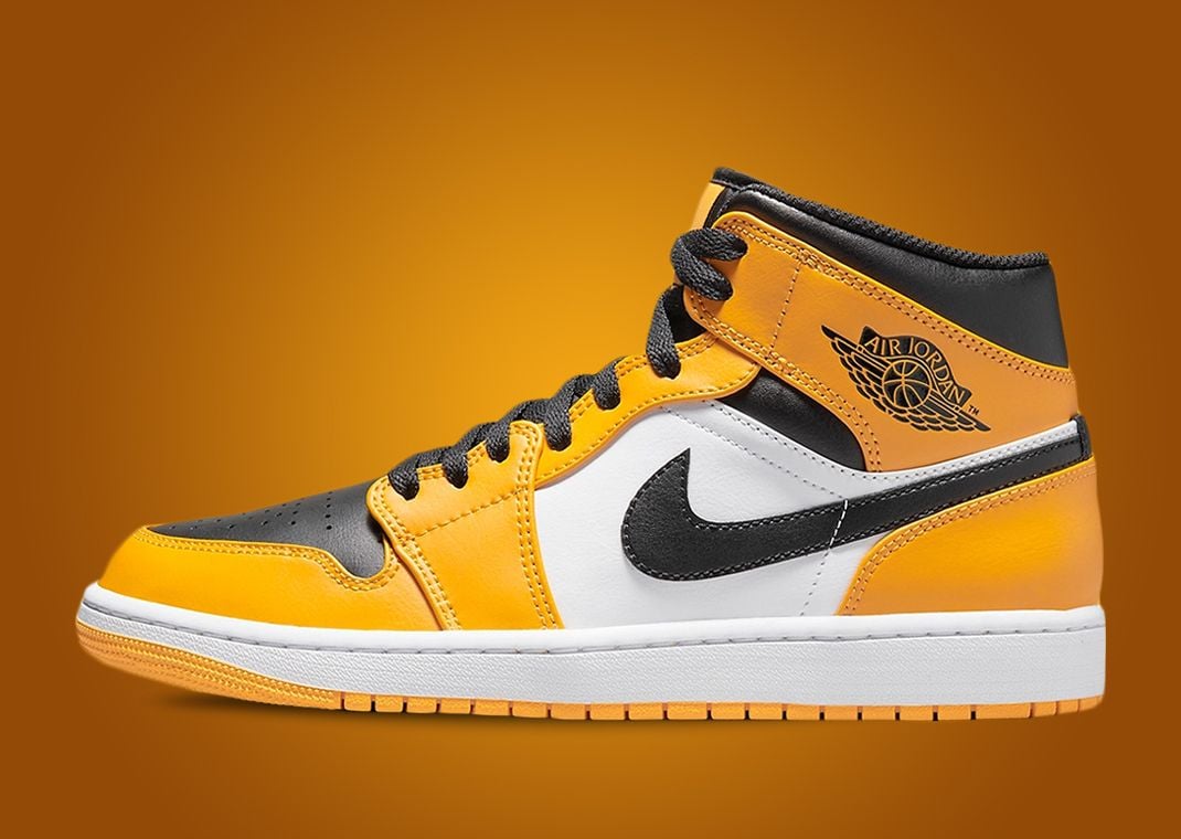 The Air Jordan 1 Mid Appears With A Yellow Toe