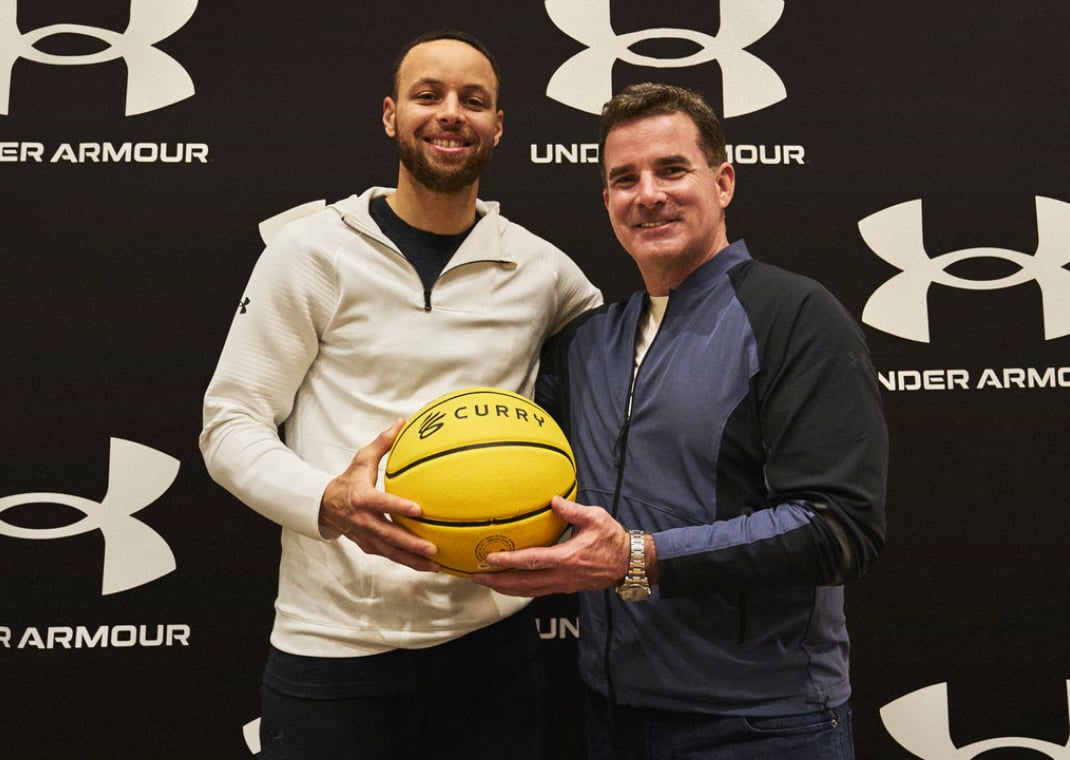 Stephen Curry with Kevin Plank, the CEO of Under Armour