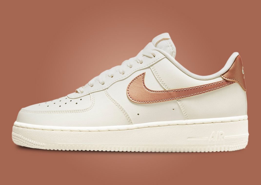 Metallic Bronze Swooshes Decorate The Nike Air Force 1 Low