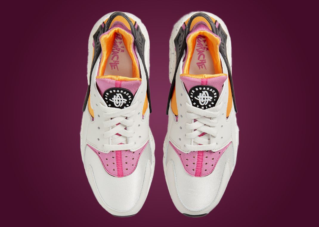 University Gold And Lethal Pink Accent This Nike Air Huarache
