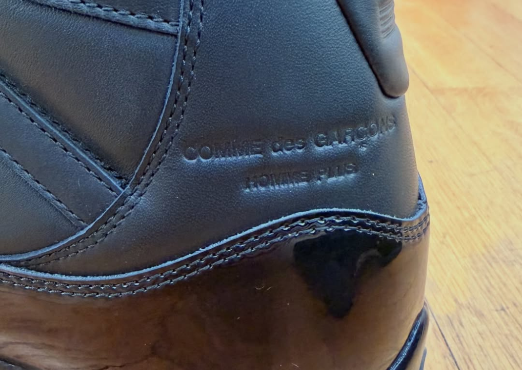 Comme des Garçons x Air Jordan 11 Black Heel