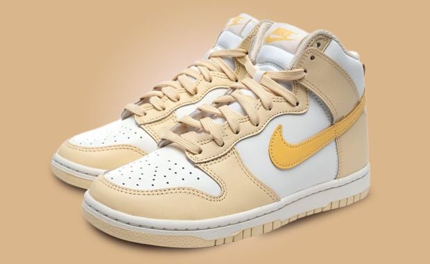 This Women’s Exclusive Nike Dunk High Comes In Pale Vanilla Topaz Gold