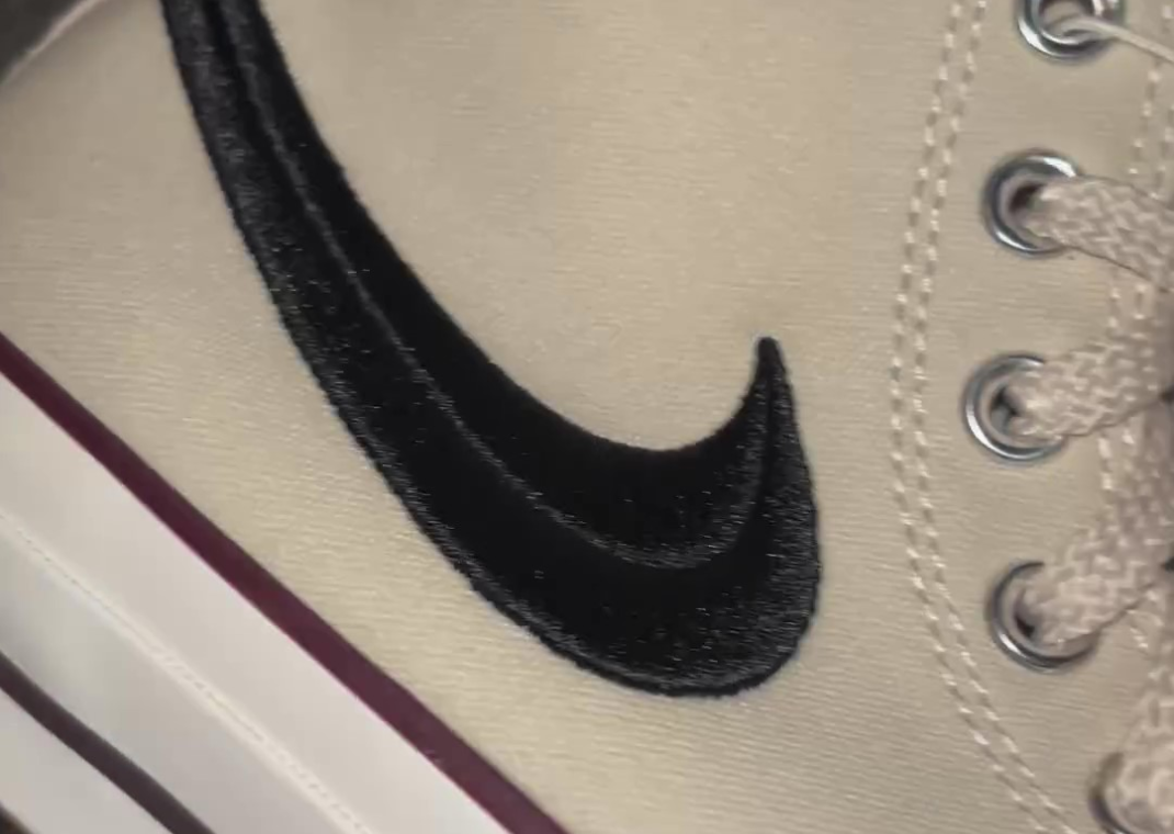 nike swoosh chuck taylor