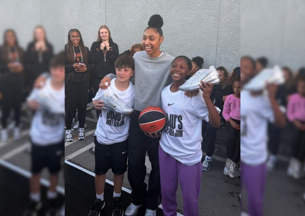 JuJu Watkins gifting her new Nike sneakers to kids from her Watts hometown
