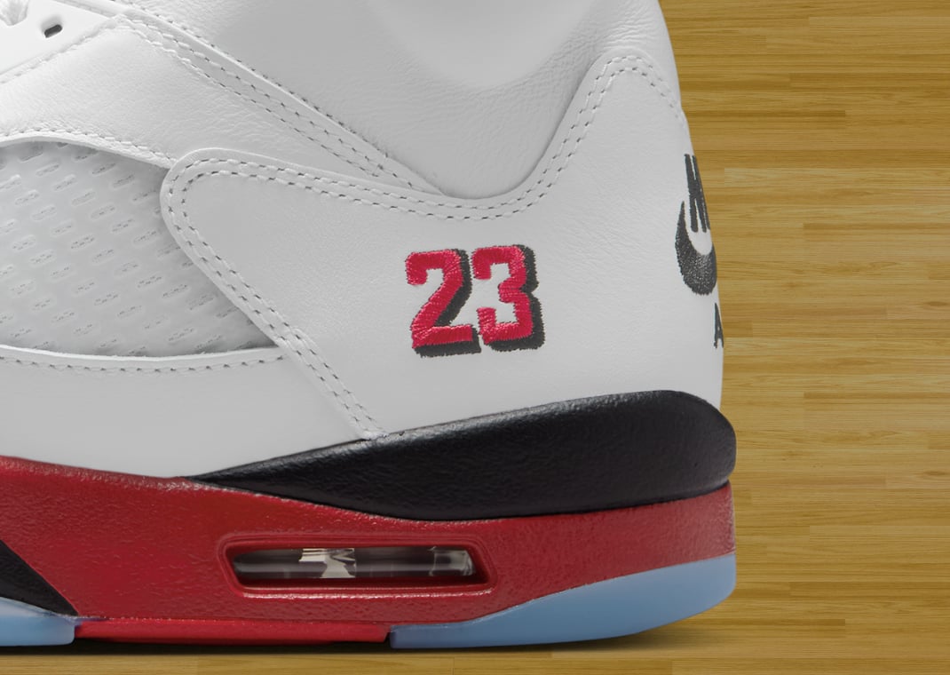 Up close look at the "23" embroidery on the Air Jordan 5 Retro Fire Red Black Tongue