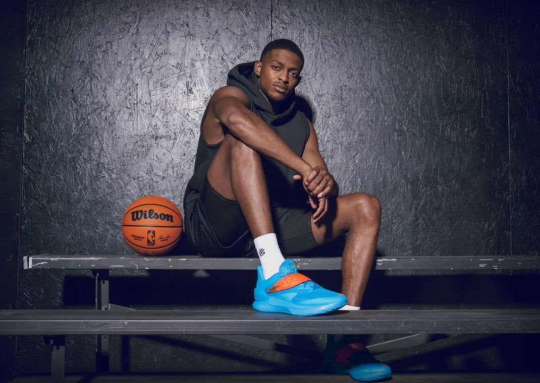 De'Aaron Fox with his first signature sneaker, the Curry Fox 1