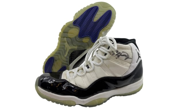 A 1996 Pair of Michael Jordan’s Game Worn and Signed Air Jordan 11 Concord is going for $10,000 at Auction
