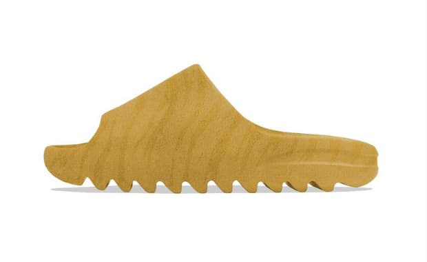 The adidas Yeezy Slide Arrives In Ochre