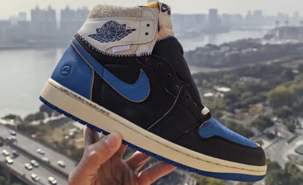 The fragment x Union LA x Jordan 1 High Sport Royal is covered in Shaggy Suede and Premium Leather