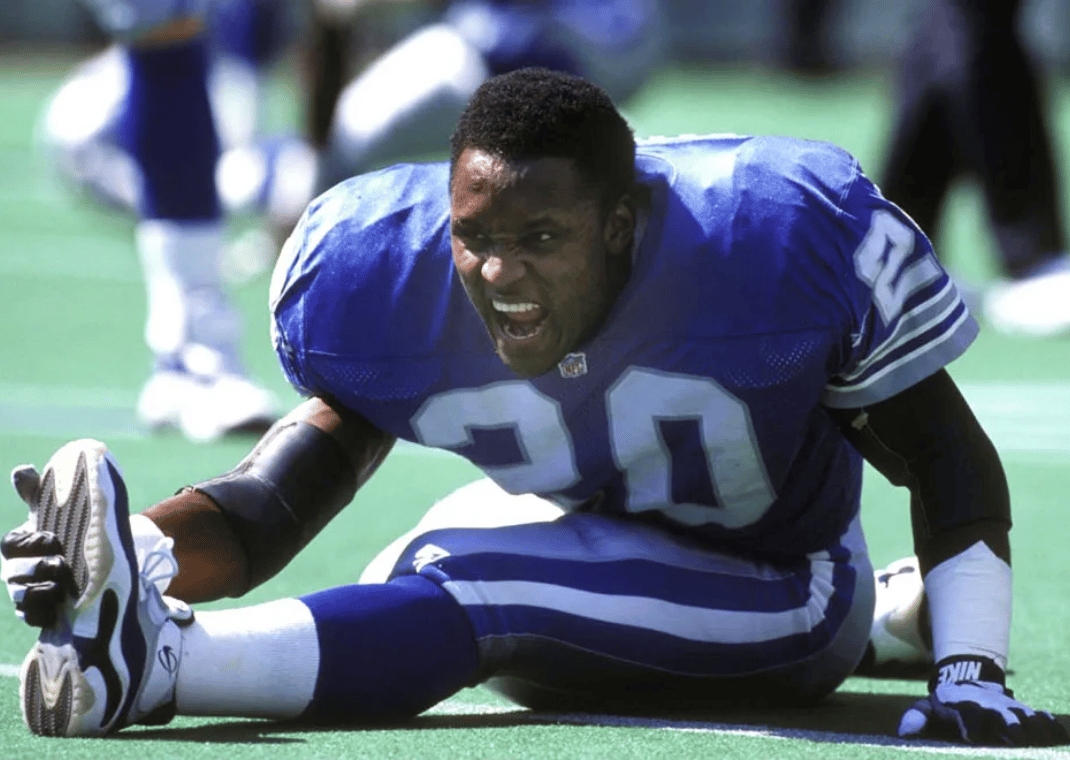 Barry Sanders wearing the Nike Zoom Turf with an Air Jordan 11 sole unit