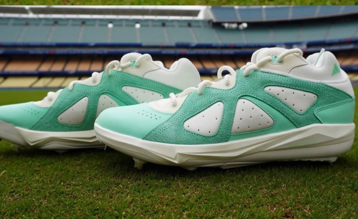 Kiké Hernandez wearing exclusive adidas BadBo 1.0 Low PE cleats in teal and white colorway during Dodgers game