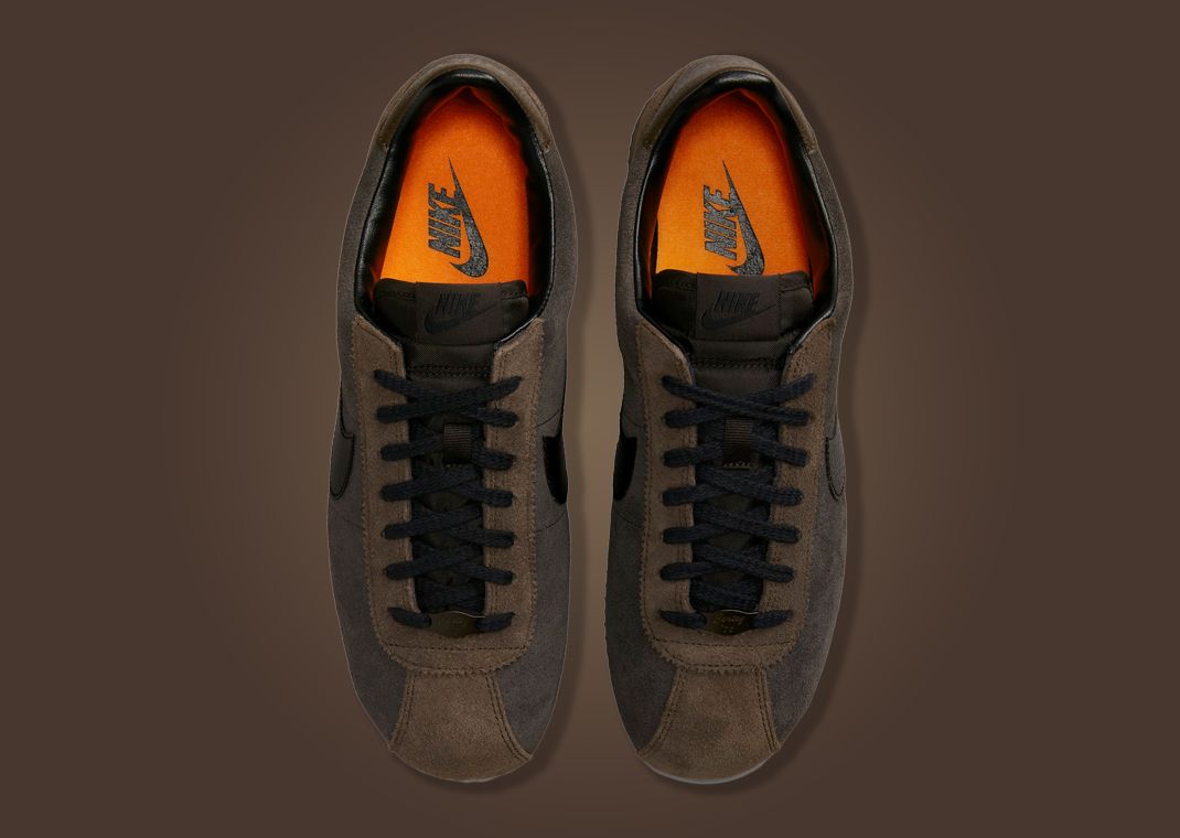 Supple Velvet Brown Suede Drapes Over The Nike Cortez