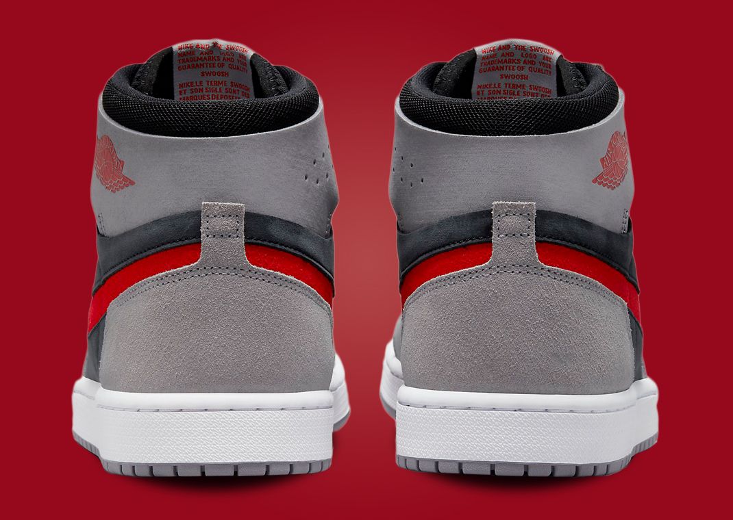 A Combo Of Black, Fire Red, And Cement Grey Cover This Air