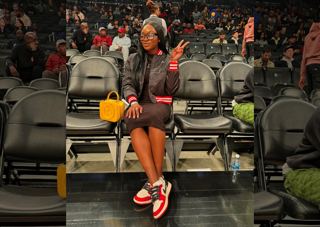 Dana Evans Courtside Wearing the Trophy Room Jordan 1 Lows