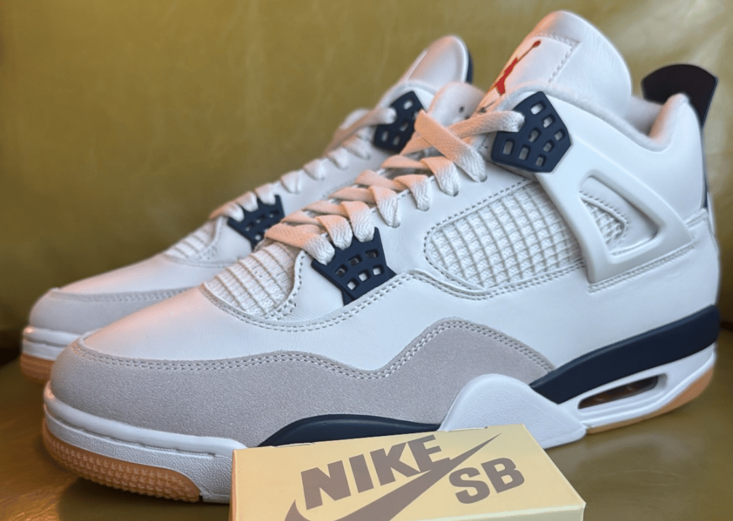 The Nike SB x Air Jordan 4 Summit White Navy Releases March 2025 The Nike SB x Air Jordan 4 Summit White Navy Releases March 2025
