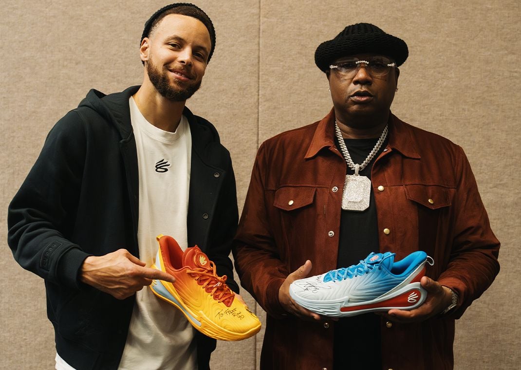 Steph Curry (left) with E-40 (right) holding the Under Armour Curry 12 What The Bay