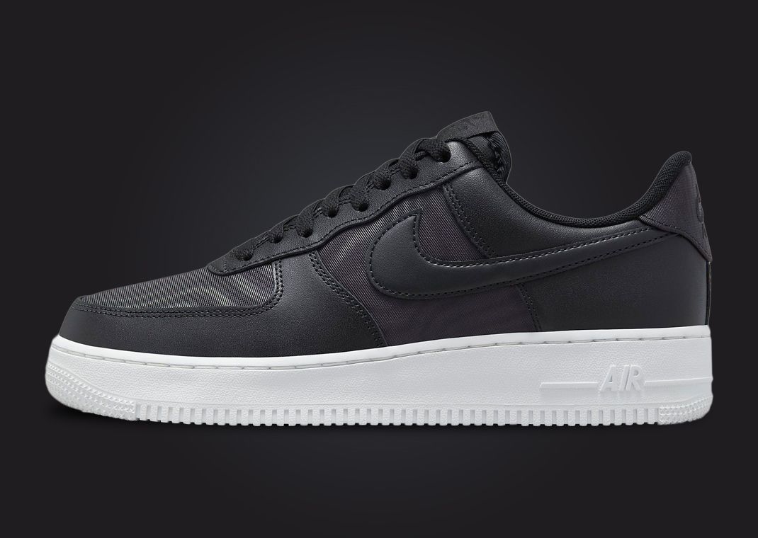 nike air force 1 black and white sole