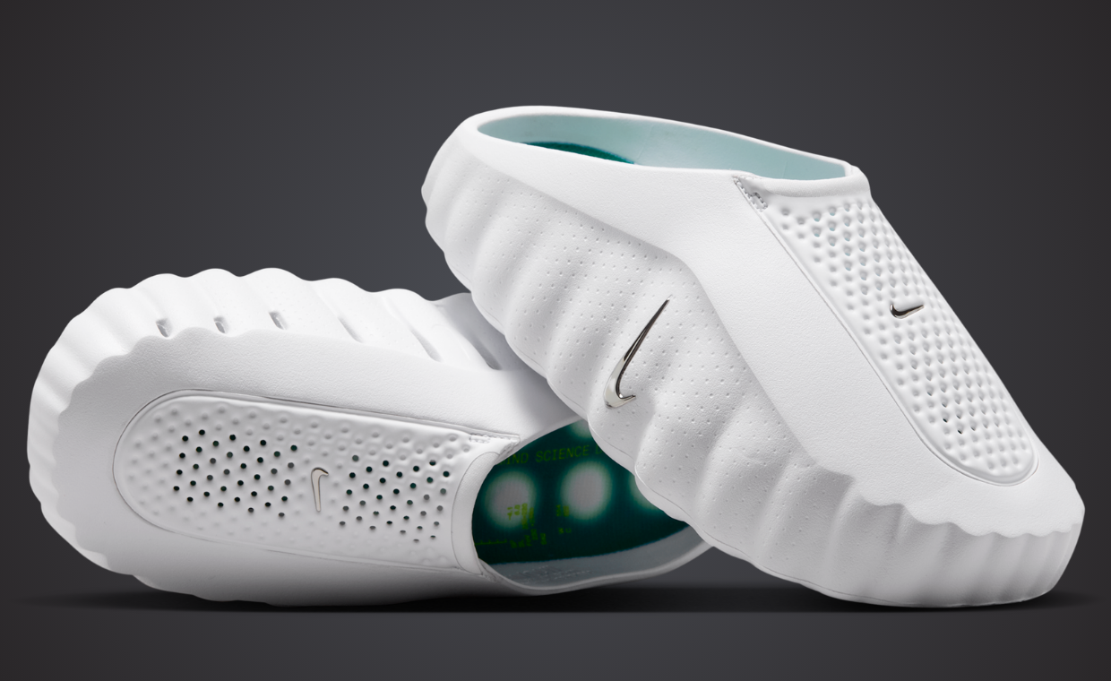 Nike Mind 001 in clean white colorway, shown from lateral angle with minimalist design aesthetic