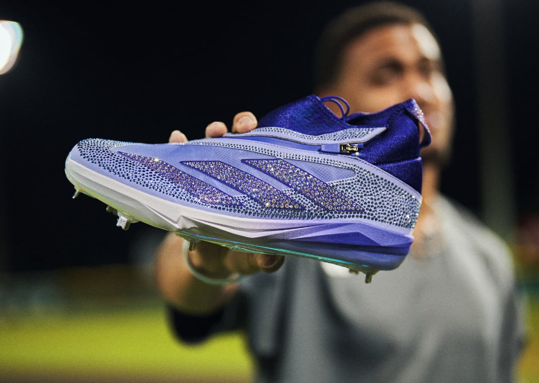 Julio Rodriguez showcasing the new Swarovski x adidas Adizero Impact+