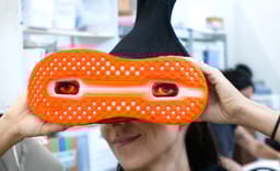 Designer Melitta Baumeister Swirls Black and Orange on Hand-Painted Nike Vomero Premium Collab