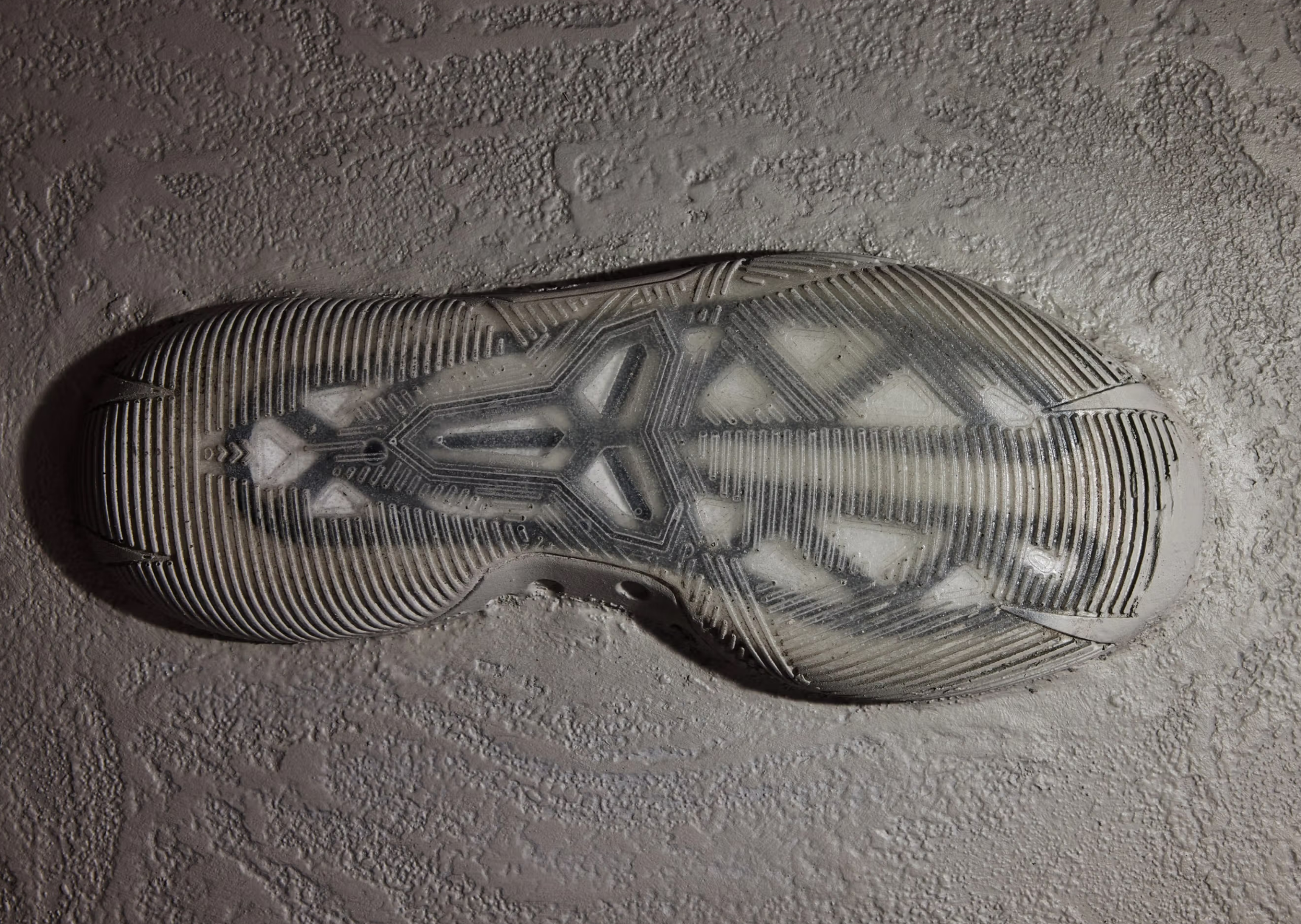 Troy Murray's mural featuring Nike Kobe signature silhouettes from Kobe 1 through Kobe AD, with an unreleased model at the end displaying a semi-transparent outsole design. - detail view 1
