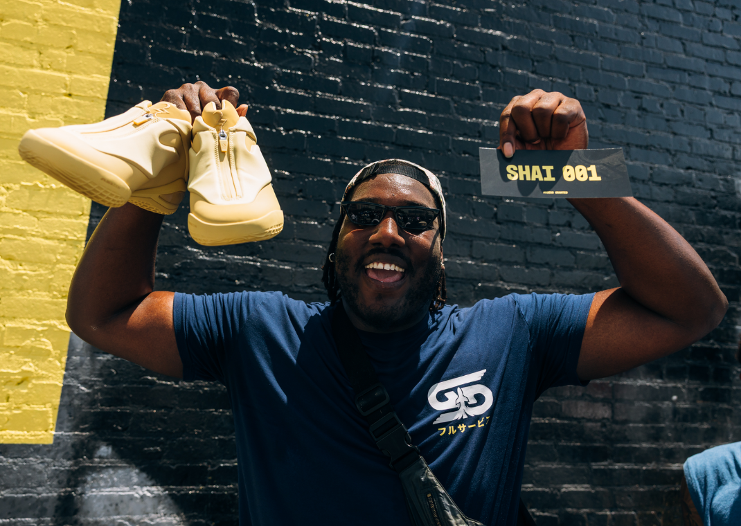 Fan winning the Converse Shai 001